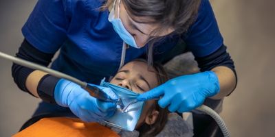 Dentists use the cleaning tools to clean the tooth for a root canal.