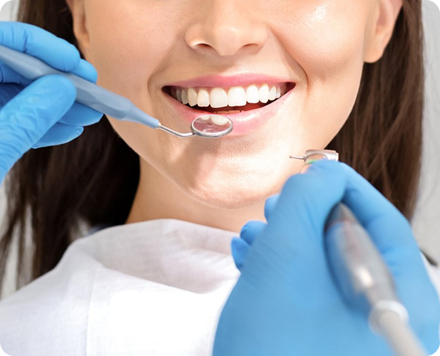 Ultrasonic teeth scaling at DentoCorrect