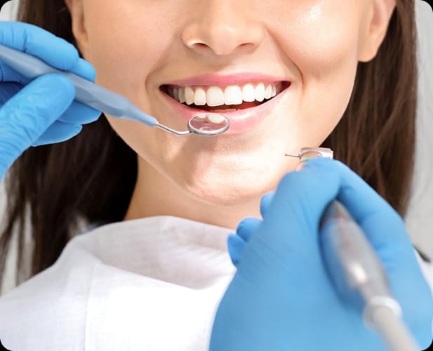 Ultrasonic teeth scaling at DentoCorrect